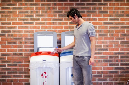Waste operatives wearing PPE during a commercial clearance operation