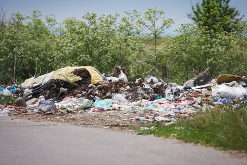 Workers sorting recyclables in a commercial setting in Uxbridge